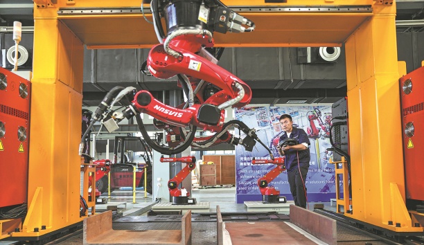 中國日報網——Experts call for more efforts in robotics